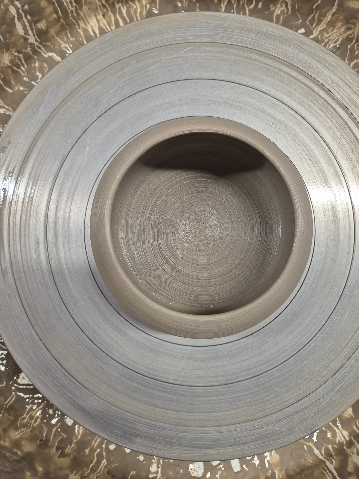 pottery wheel with clay